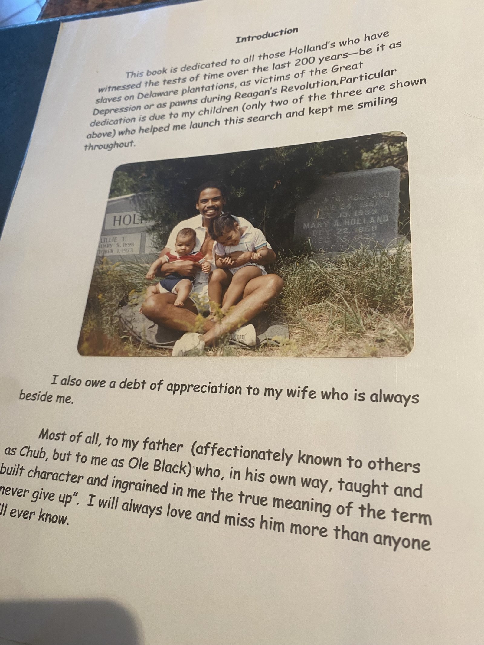 Dedication page with a photograph of a father and child