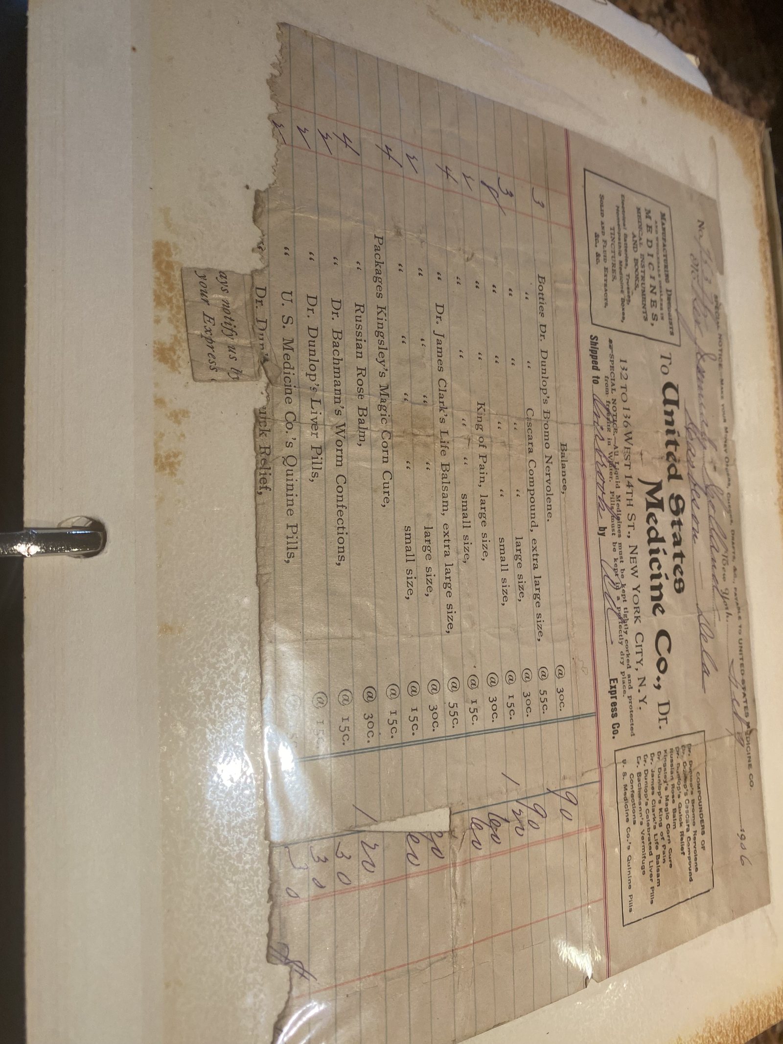 Old scrapbook page with a United States Medicine Co. ledger clipping